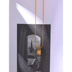 Elegant Petite Gold Finish Shell Pendant Necklace